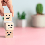 smile-face-and-cart-icon-on-wood-cube-optimistic-person-or-people-feeling-inside-and-service-rating-when-shopping-satisfaction-concept